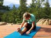 Photo of Elle Bieling doing the Half Shoelace Pose in Yin Yoga