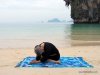 Photo of Elle Bieling doing the Shoelace Pose in Yin Yoga