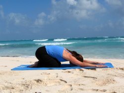 Child's Pose on beach near Playa del Carmen, Mexico