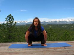 Garland Pose, yoga pose with a view of the Sangre de Cristo Mountains, Colorado
