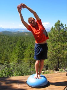 Standing Side Bend to Right with Hands Over Head on the Bosu Ball