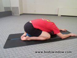 Child’s Pose with a Yoga Block
