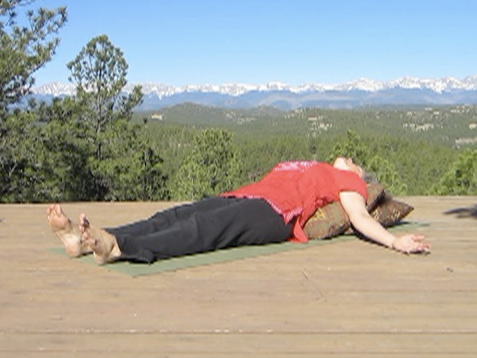 Supported Fish Pose using cushions.