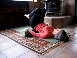 Knees to chest

on foam roller, knees in neutral position.