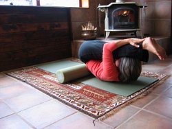 Full inverted forward bend on foam roller