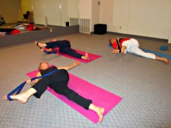 Lying Leg Crossover with Yoga Strap