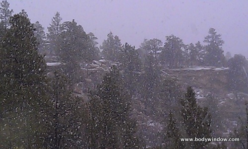 Snowing on Cliff