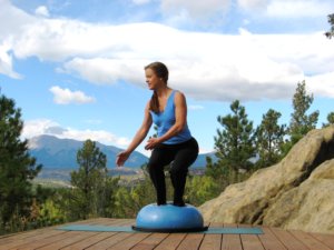 Bosu balance trainer, twisting squat, right.