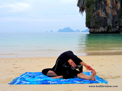 Yin Yoga's, Lateral Half Dragonfly Pose, Hand to Big Toe, Pranang Beach, Railay, Thailand